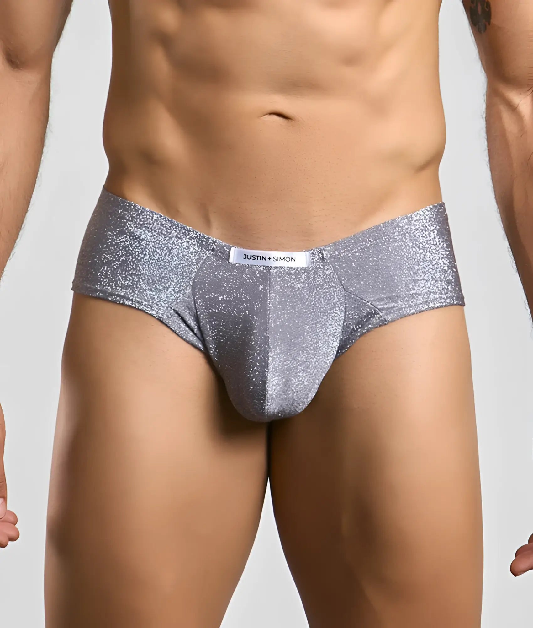 Silver glitter briefs with a sleek form-fitting design and branded waistband from Justin + Simon cheek collection
