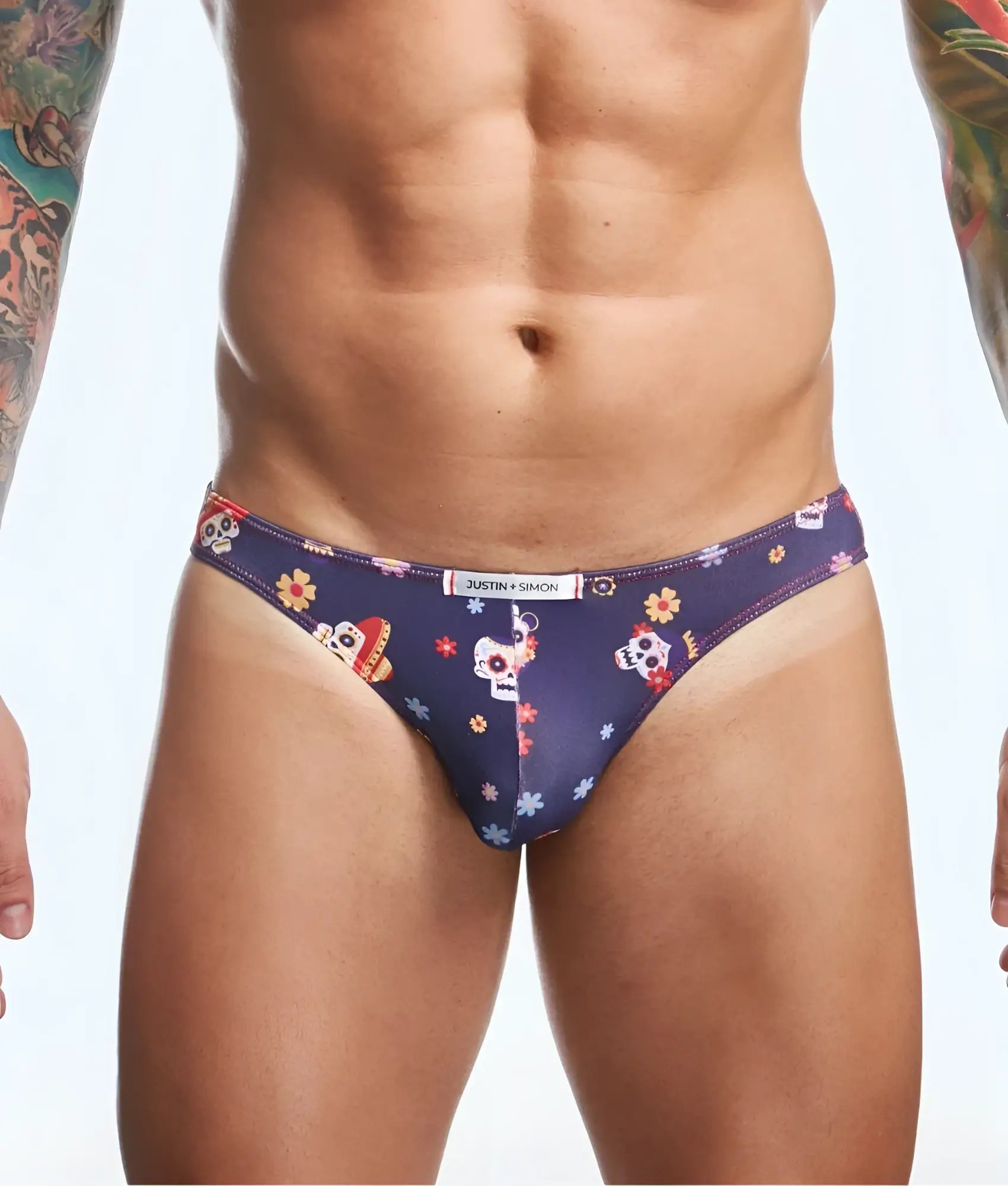 Dark blue mens briefs with vibrant sugar skull and floral pattern and justin simon waistband classic fun prints