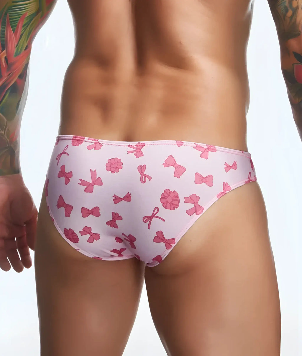 Justin + Simon classic mens bikini swim trunks with pink bow and flower pattern for fun prints collection