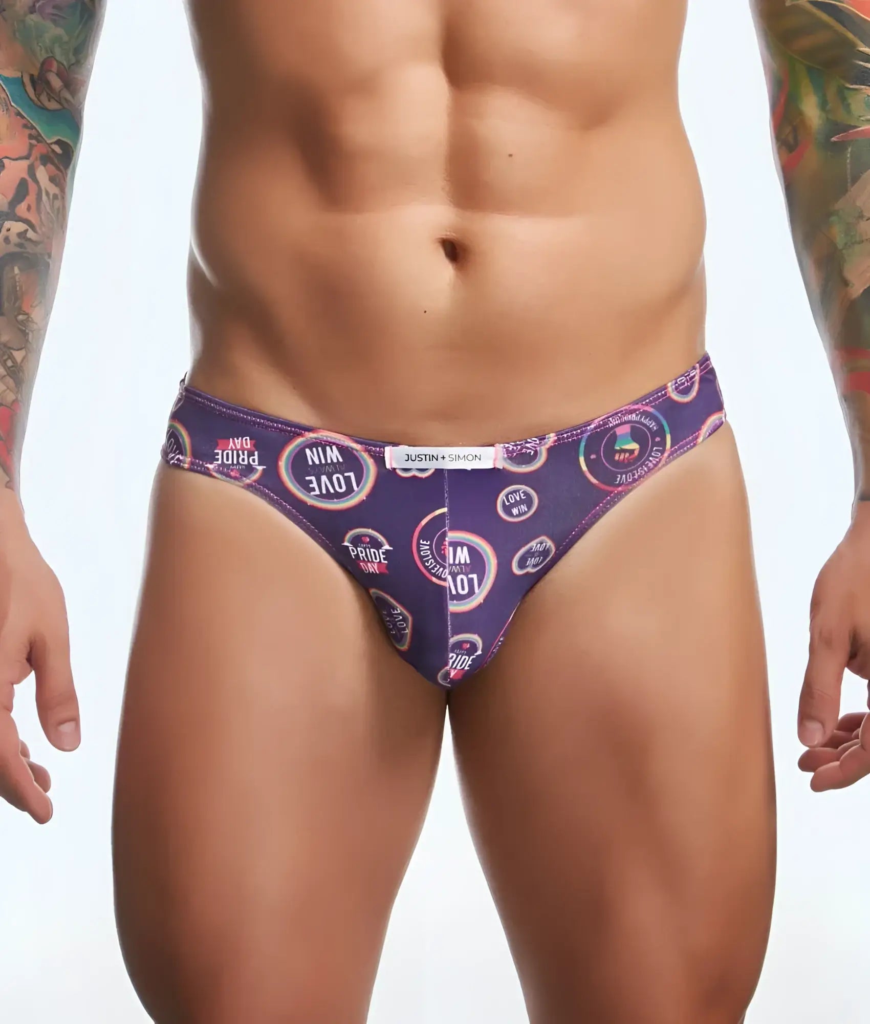 Justin + simon classic mens bikini briefs in purple with pride day love win text and rainbow pattern