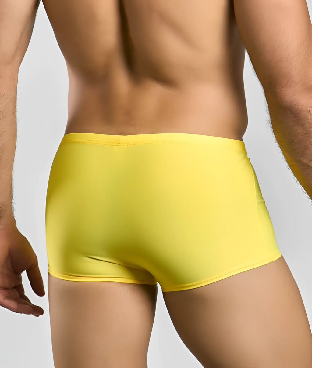 Justin + Simon classic boxer bright yellow swim trunks with smooth stretchy fabric and form-fitting design