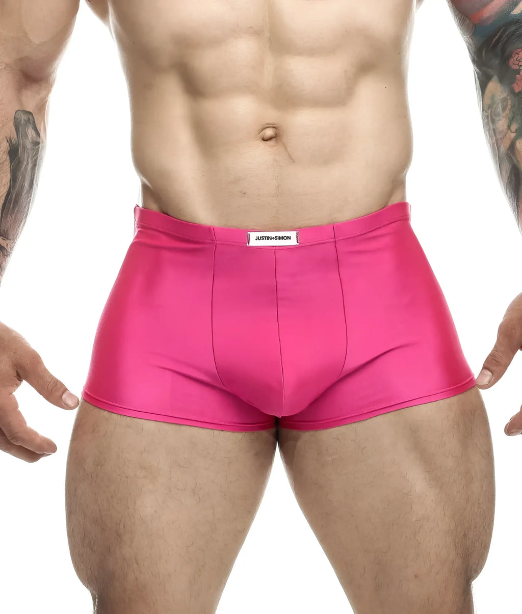Justin + Simon classic boxer briefs in vibrant pink shiny fabric with a white justin-simon label at the waistband