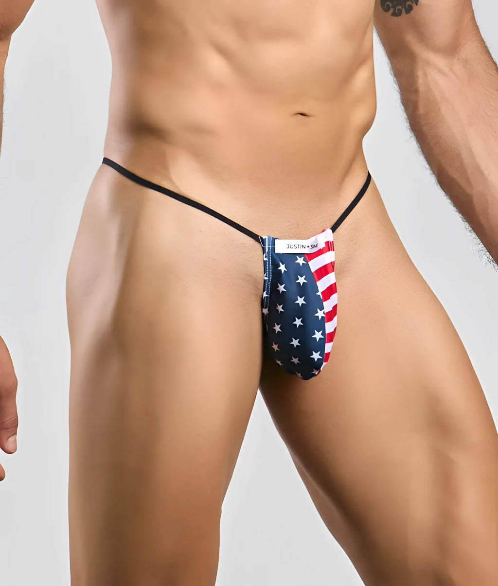 American flag patterned Justin Simon classic g-string bulge thong with black elastic straps and brand label shown from back