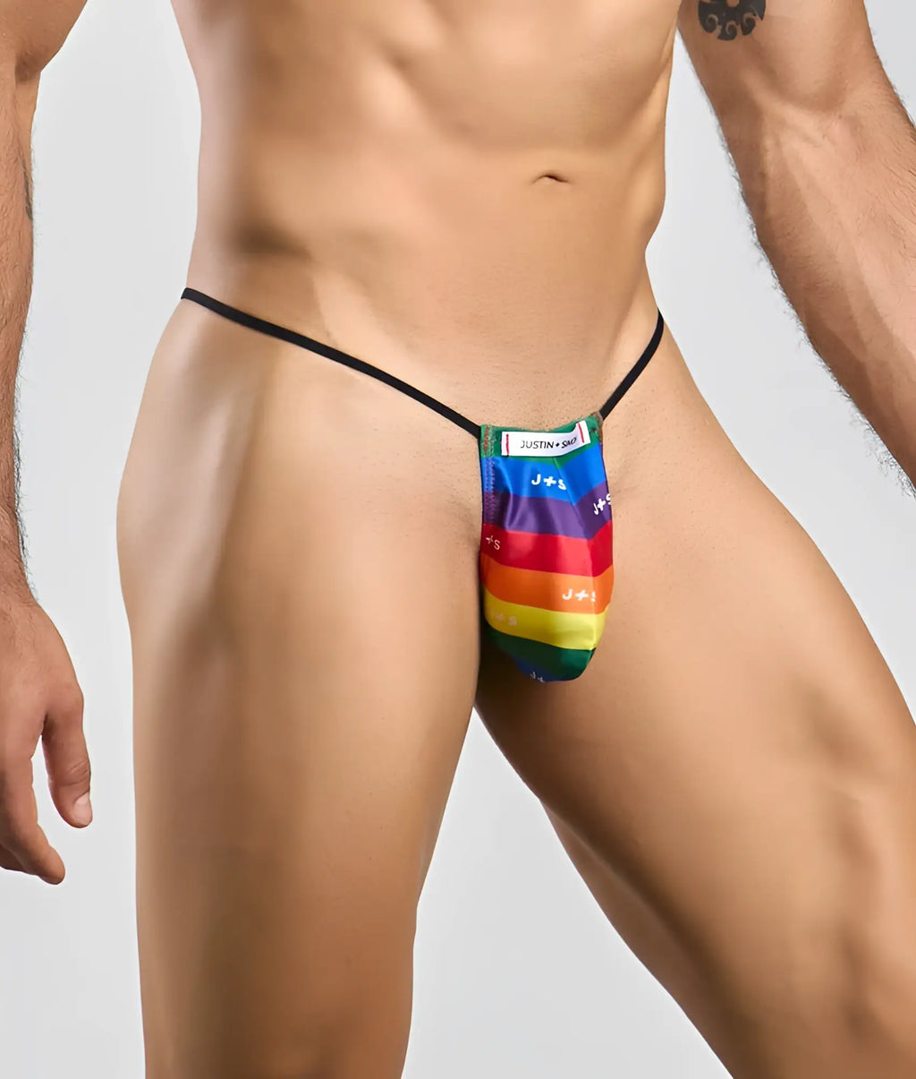 Justin Simon classic g-string bulge featuring a rainbow-striped fabric thong with black elastic waistband and brand label