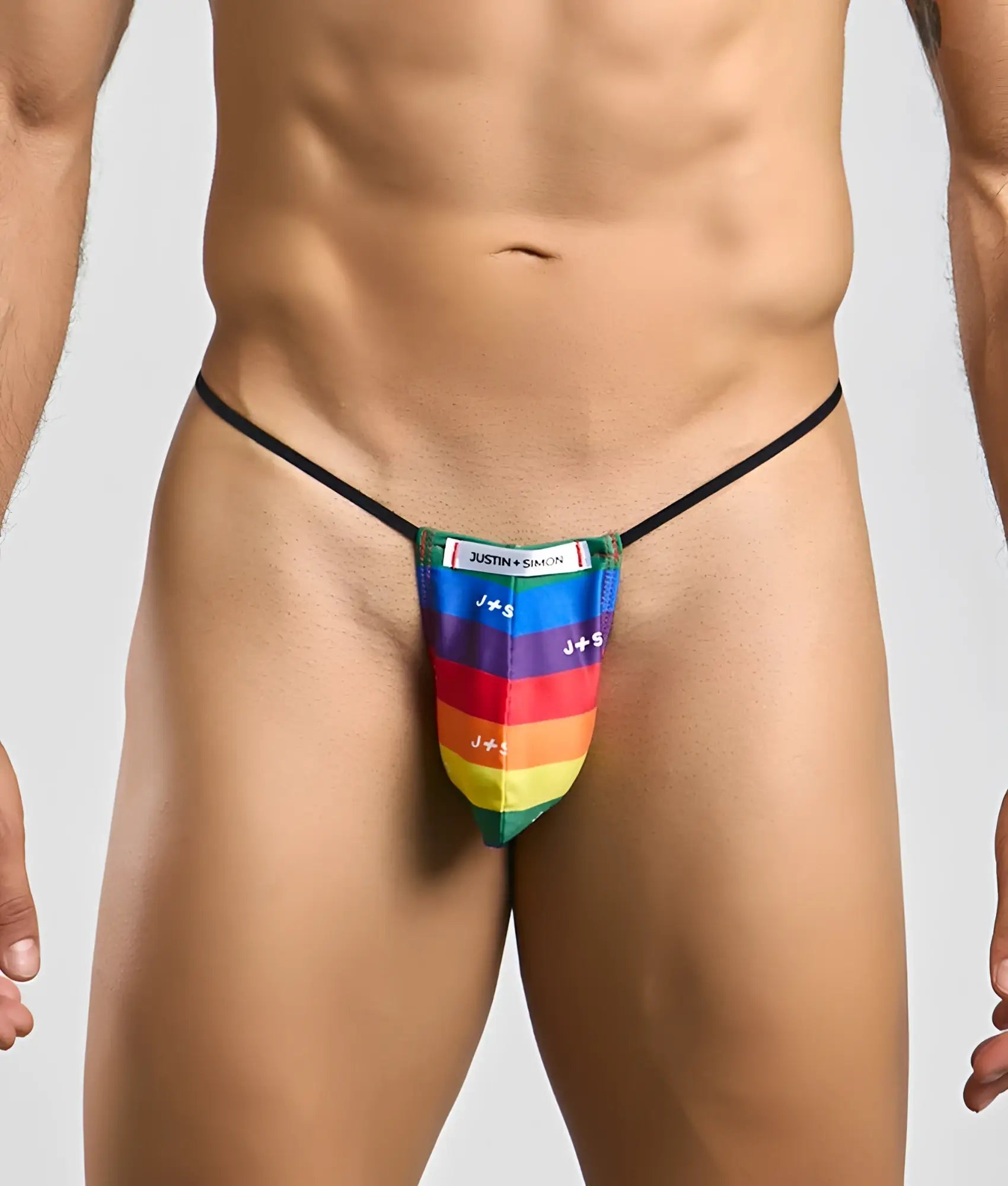 Rainbow-striped classic g-string bulge with black elastic waistband and j+ s branding by justin + simon