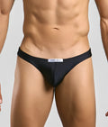 Black justin + simon classic mens bikini briefs with sleek form-fitting design and subtle brand tag at the waistband