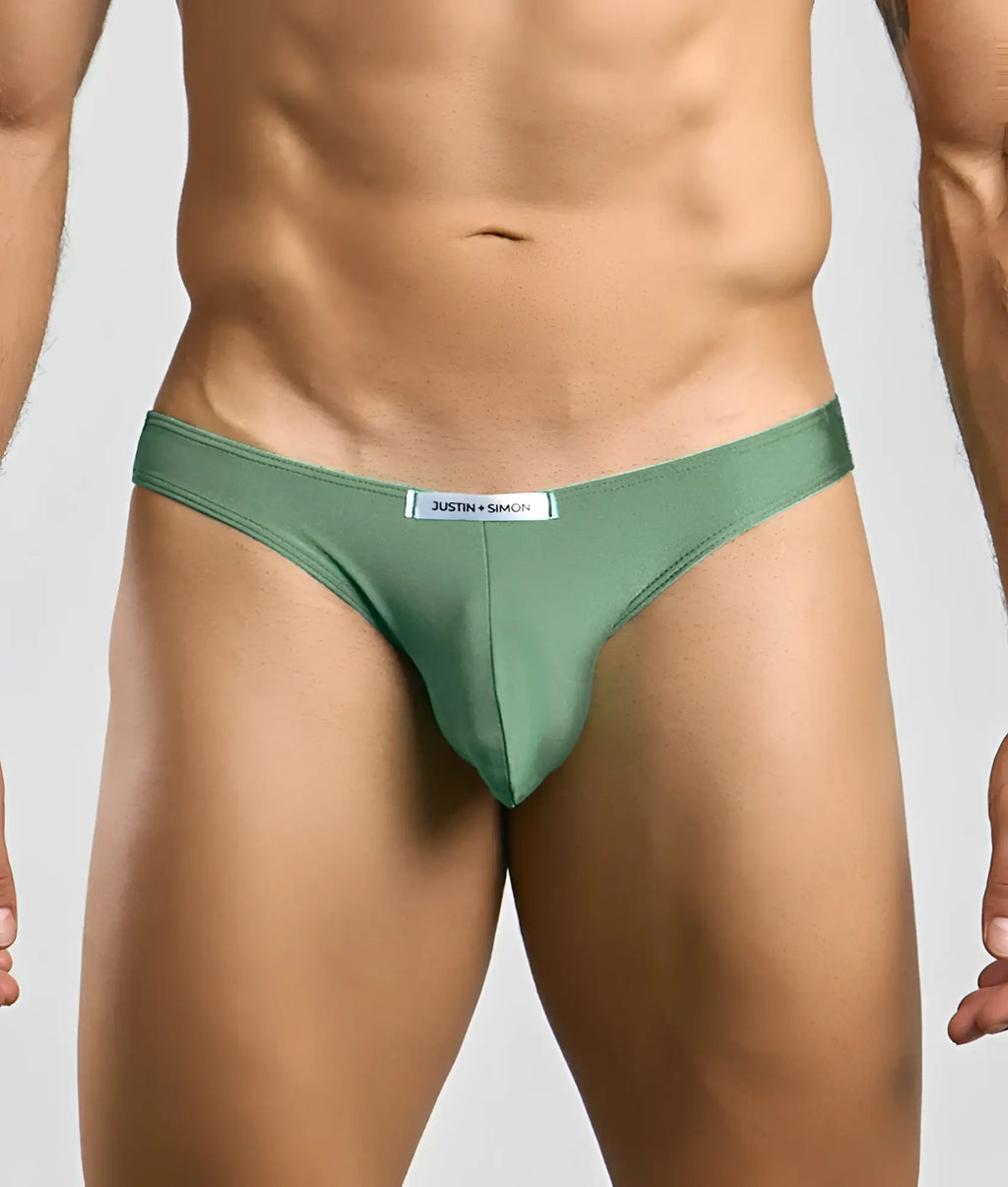 Justin + Simon Classic mens bikini sleek olive-green thong made of smooth fabric with subtle sheen and branded waistband
