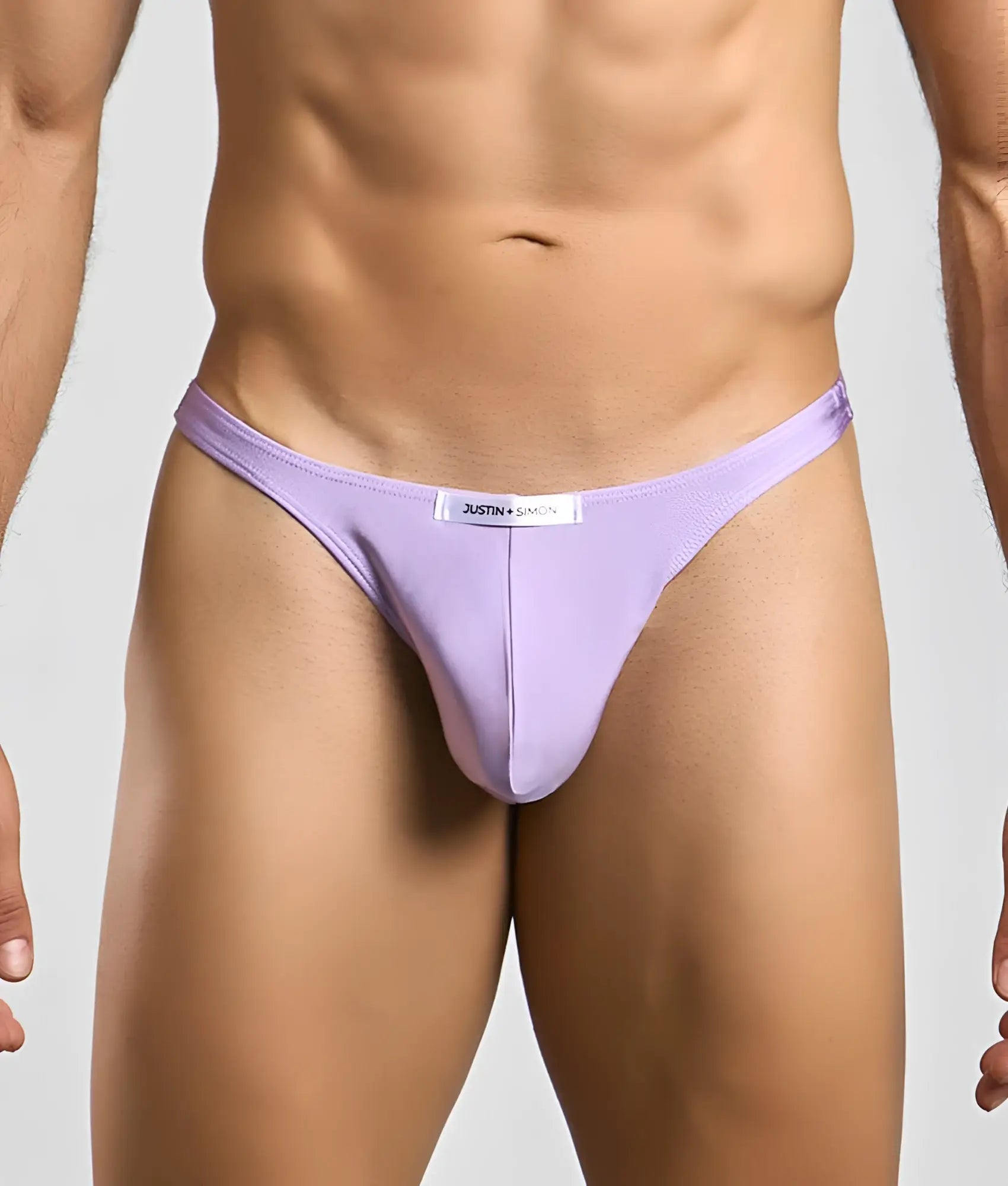 Lavender-colored form-fitting classic tanga thong by justin simon designed for comfortable everyday wear