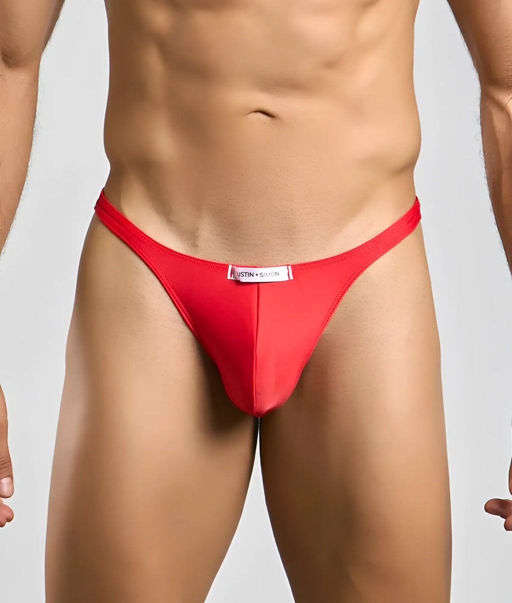 Red thong classic tanga by justin and simon showing back side with white label at the waistband