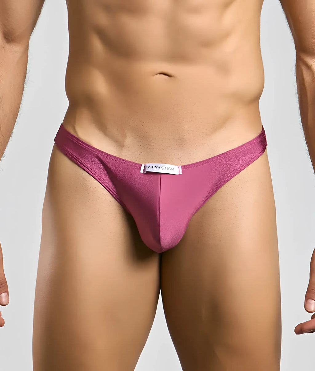 Justin plus Simon classic tanga magenta thong with smooth fabric and minimalist design showing the back side