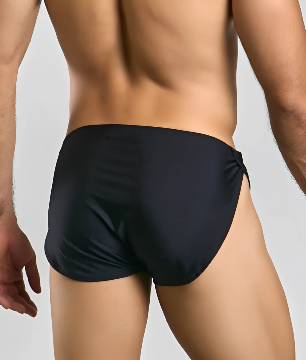 Justin + Simon running short swim trunks in black with a tailored fit and side-tie design for active wear