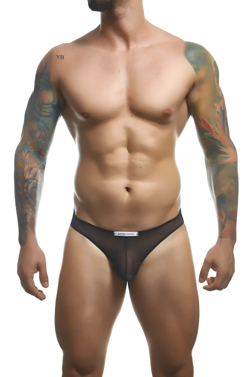 Black mesh briefs with a white label at the waistband from justin simon xsj01 classic bikini collection