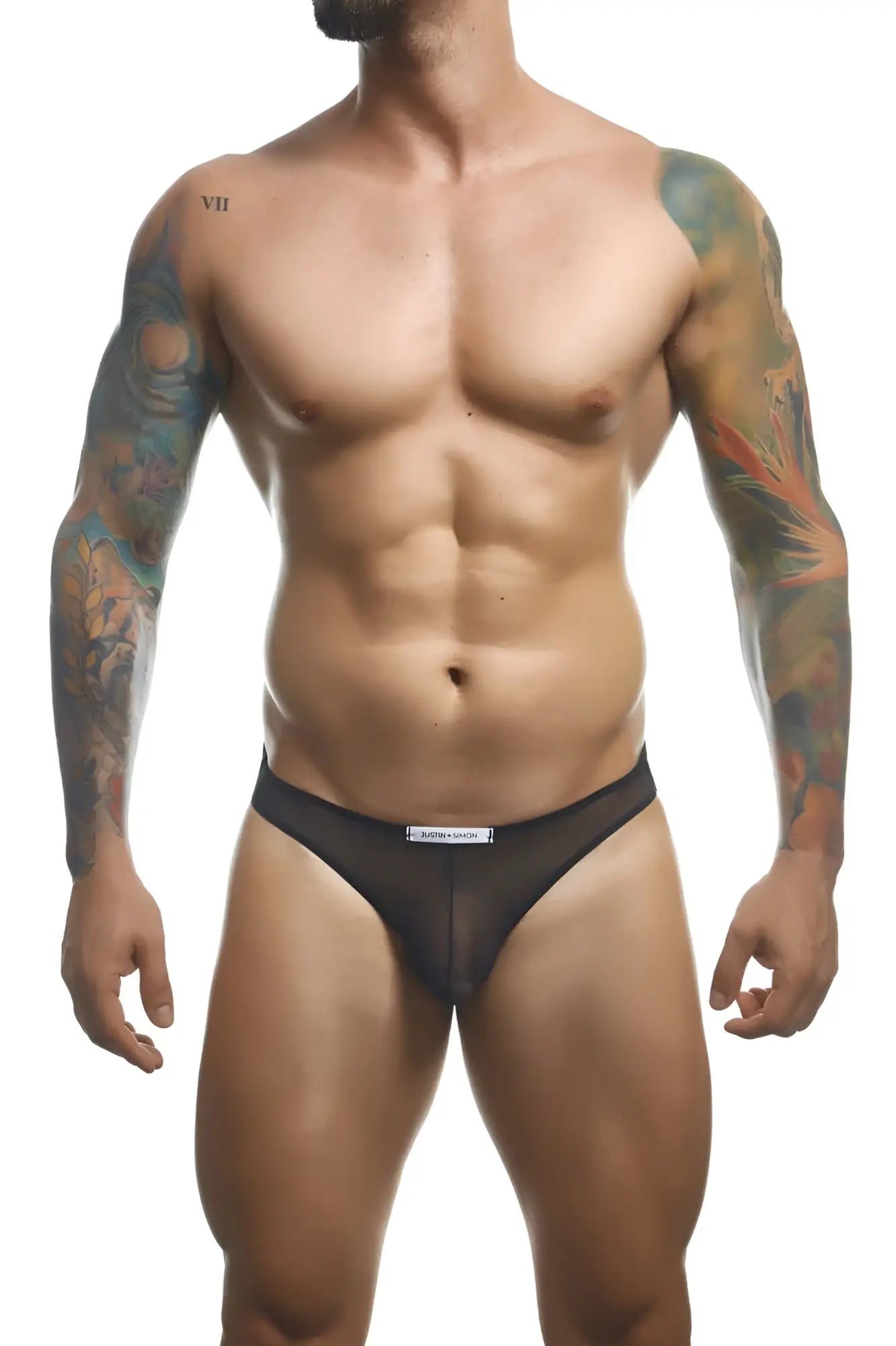 Black mesh briefs with a white label at the waistband from justin simon xsj01 classic bikini collection