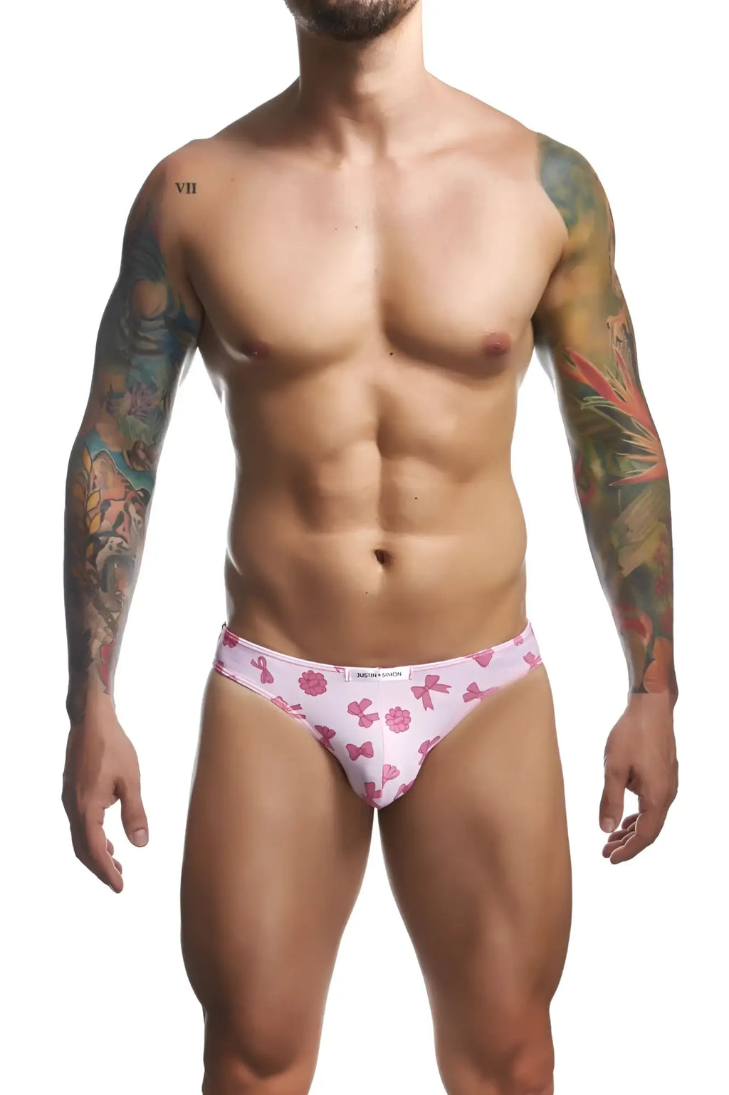 Pink briefs with pink bows and ribbons pattern and calvin klein waistband from justin simon xsj01 classic bikini color coquette