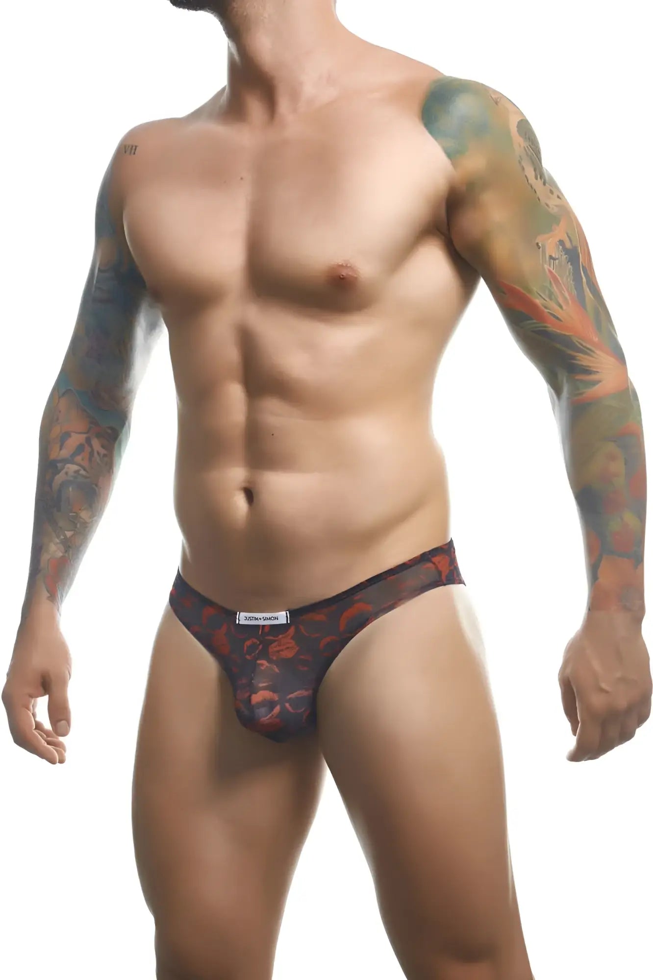Black and red floral patterned men’s briefs in sheer mesh fabric from JUSTIN SIMON classic bikini color lips collection