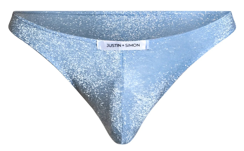 Light blue glittery lurex thong by Justin plus Simon from the classic bikini XSJ01 collection, front view