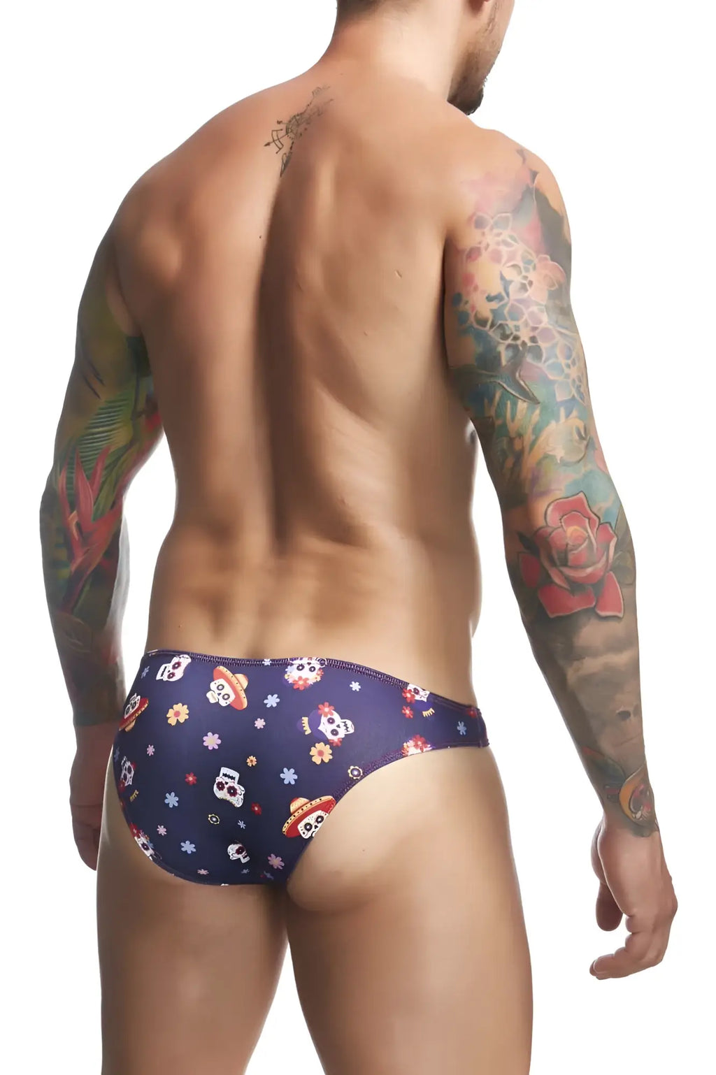 Dark blue men’s swim trunks justin simon xsj01 with colorful skulls wearing sombreros and small flowers pattern