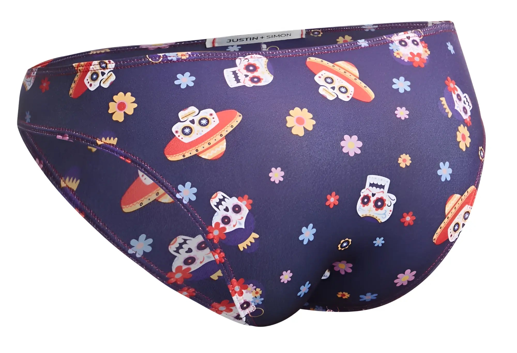 Dark purple justin simon xsj01 classic bikini swim trunks with vibrant sugar skull and ufo pattern in mexico colors