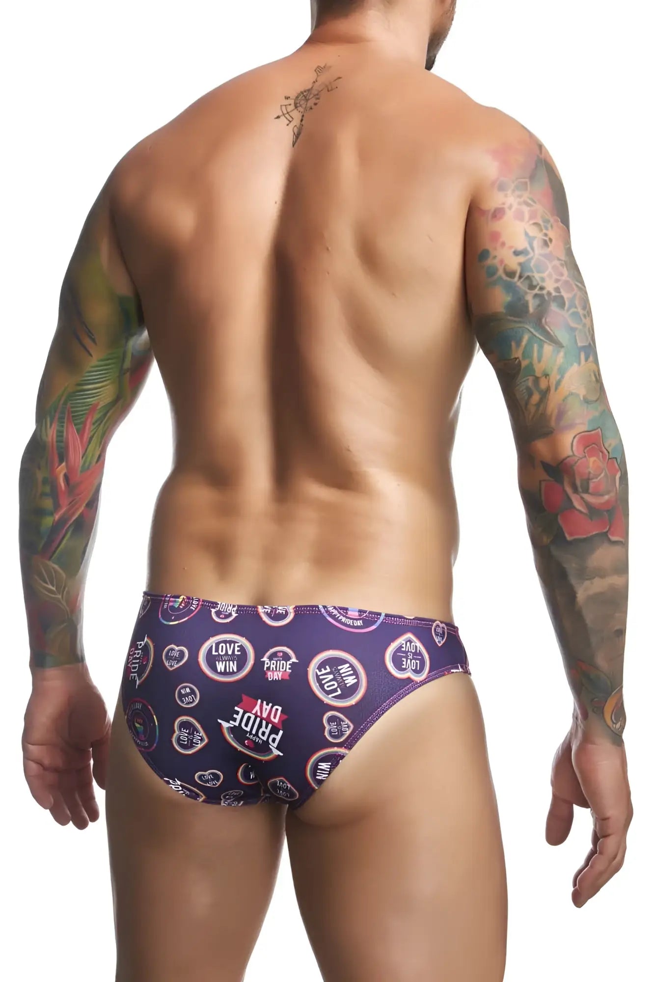 Purple patterned swim trunks with love win pride day text and heart motifs from justin simon xsj01 classic bikini color pride