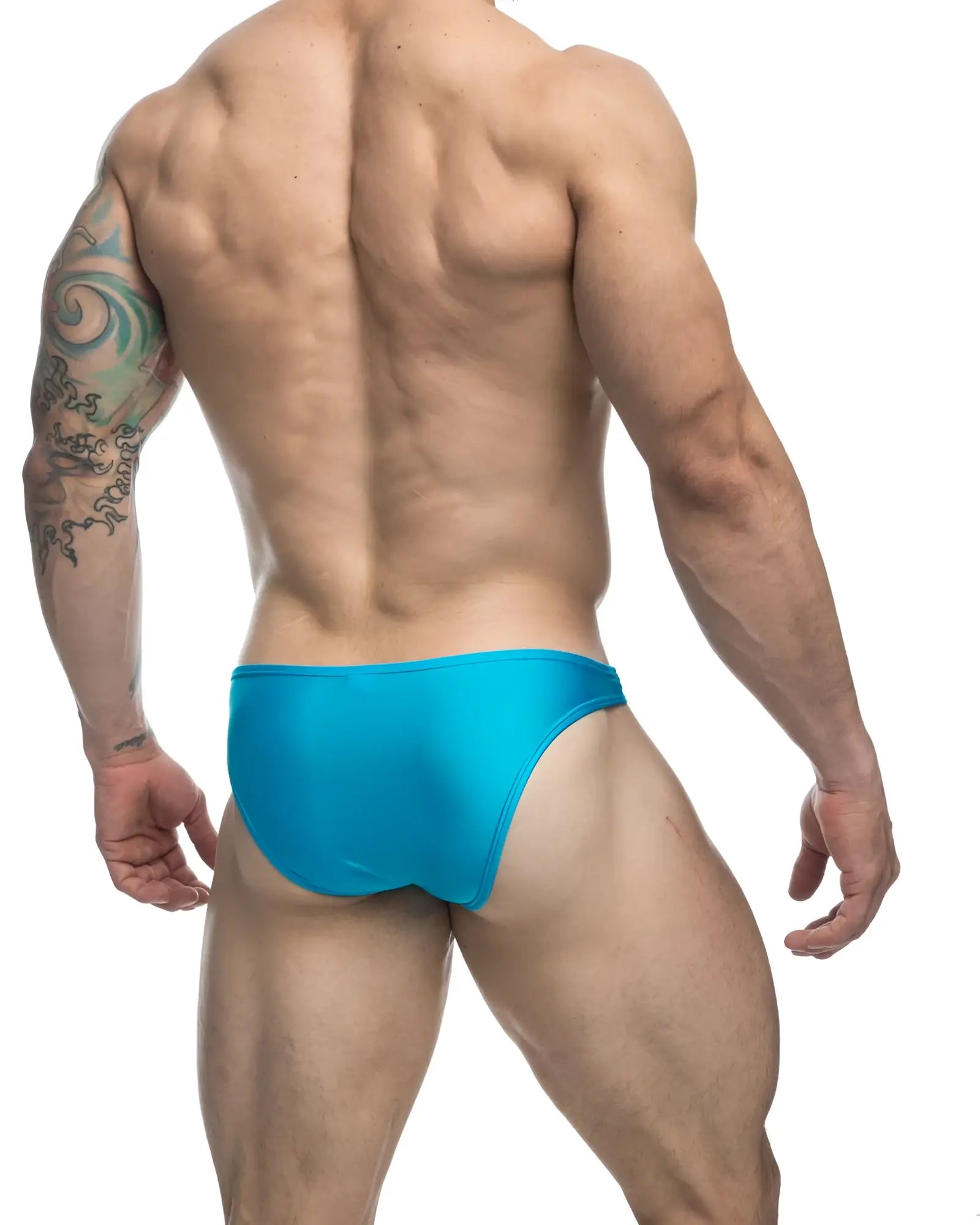 Bright turquoise justin simon xsj01 classic bikini swim trunks with sleek form fitting design for swimming