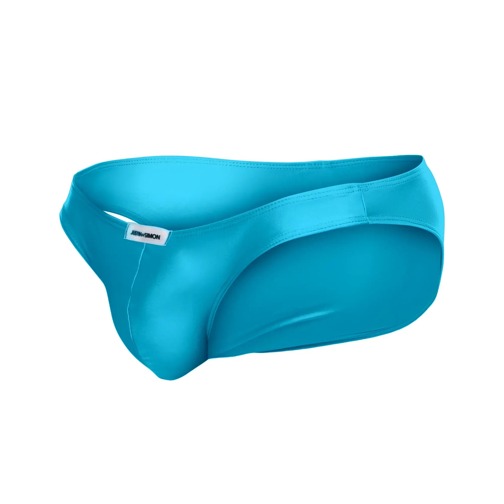 A sleek bright turquoise men’s brief with a smooth satin finish and minimalist design from justin simon xsj01 classic bikini