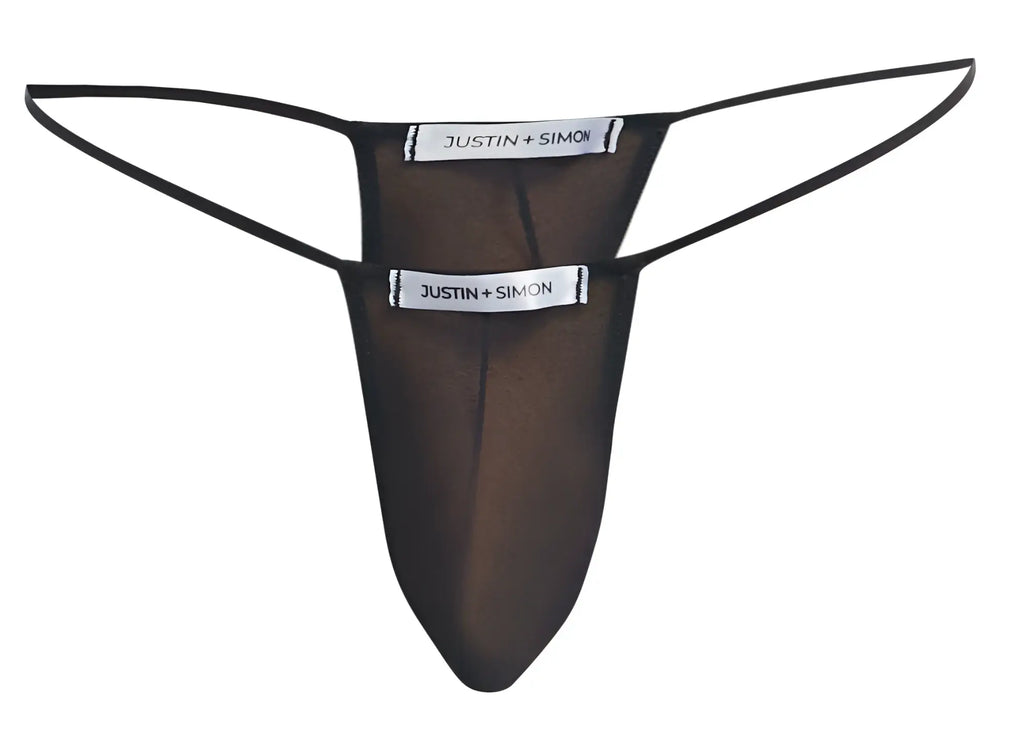 Black sheer mesh thong with thin elastic straps and justin simon branding on white tags front view