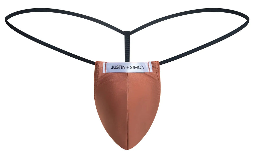 A tan smooth-textured justin simon thong with black elastic straps in ochre classic g-string style showing the back
