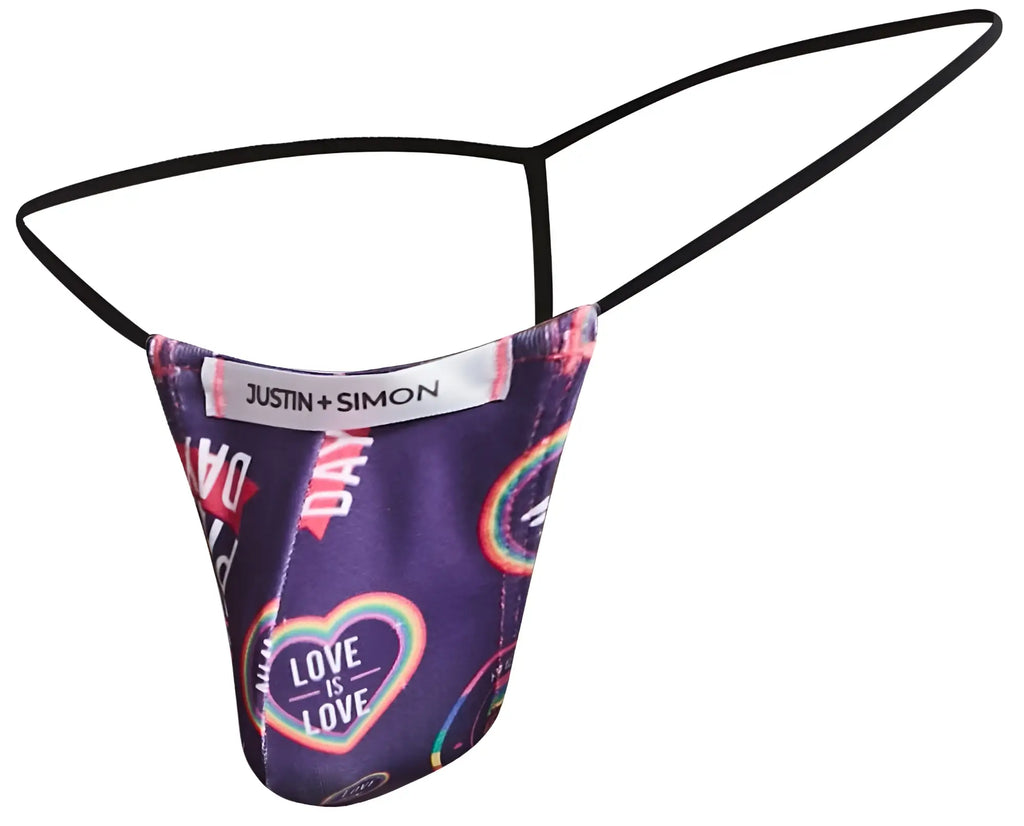 Purple patterned classic g-string thong with black elastic straps and justin simon brand label from color pride collection