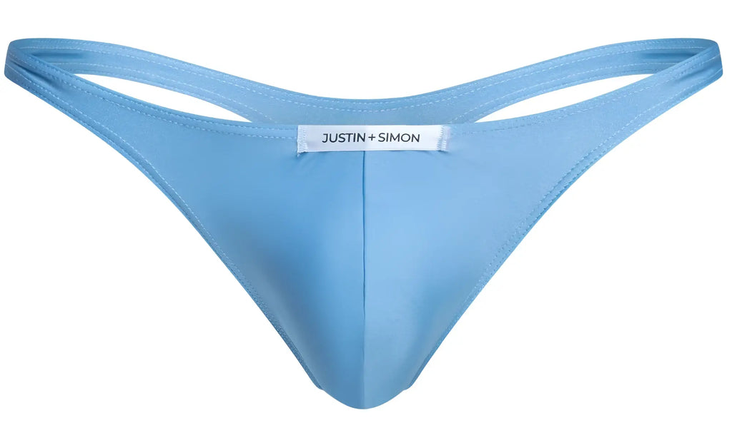 Light blue satin classic thong with white justin simon label at center back in baby blue color