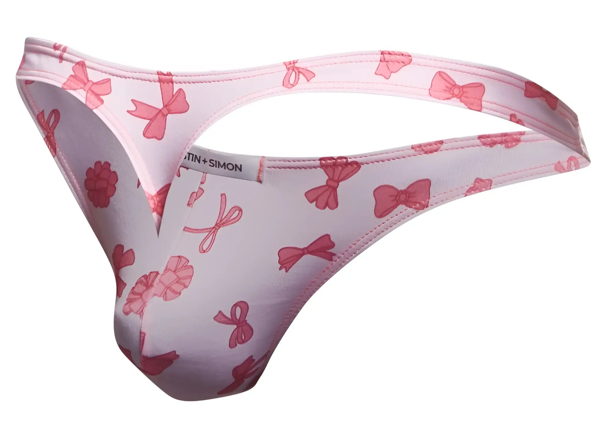 Pink bow-patterned men’s thong by martin+simon from the justin+simon xsj03 classic thongs color coquette line