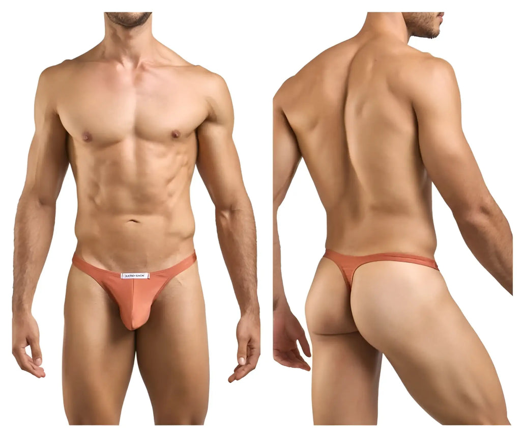 A sleek peach ochre thong from JUSTIN SIMON XSJ03 made of smooth fabric with a minimalist design and white label
