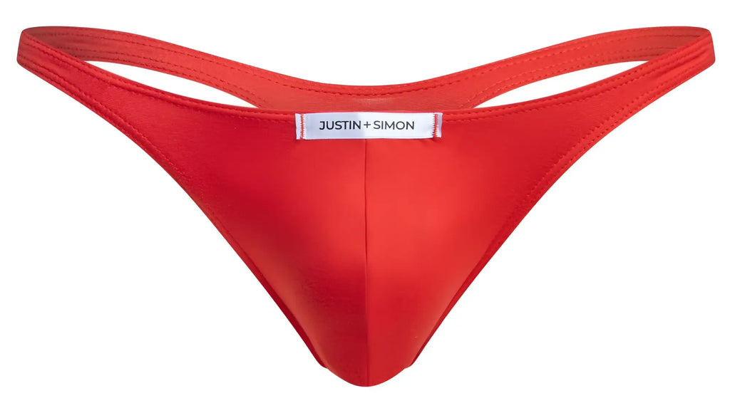 Bright red smooth satin thong by Justin Simon with white brand label classic peach red color XSJ03 model
