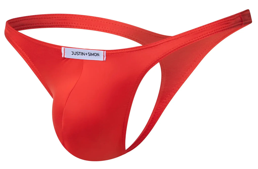 Red justin simon thong in peach red with smooth seamless fabric and minimalist design classic style front view