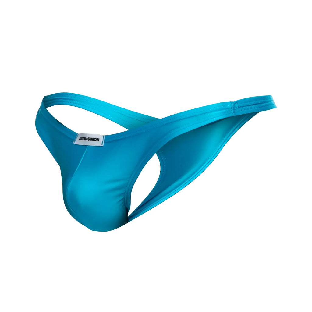 Bright turquoise justin simon classic thong made of smooth stretchy fabric with sleek design and waistband brand tag
