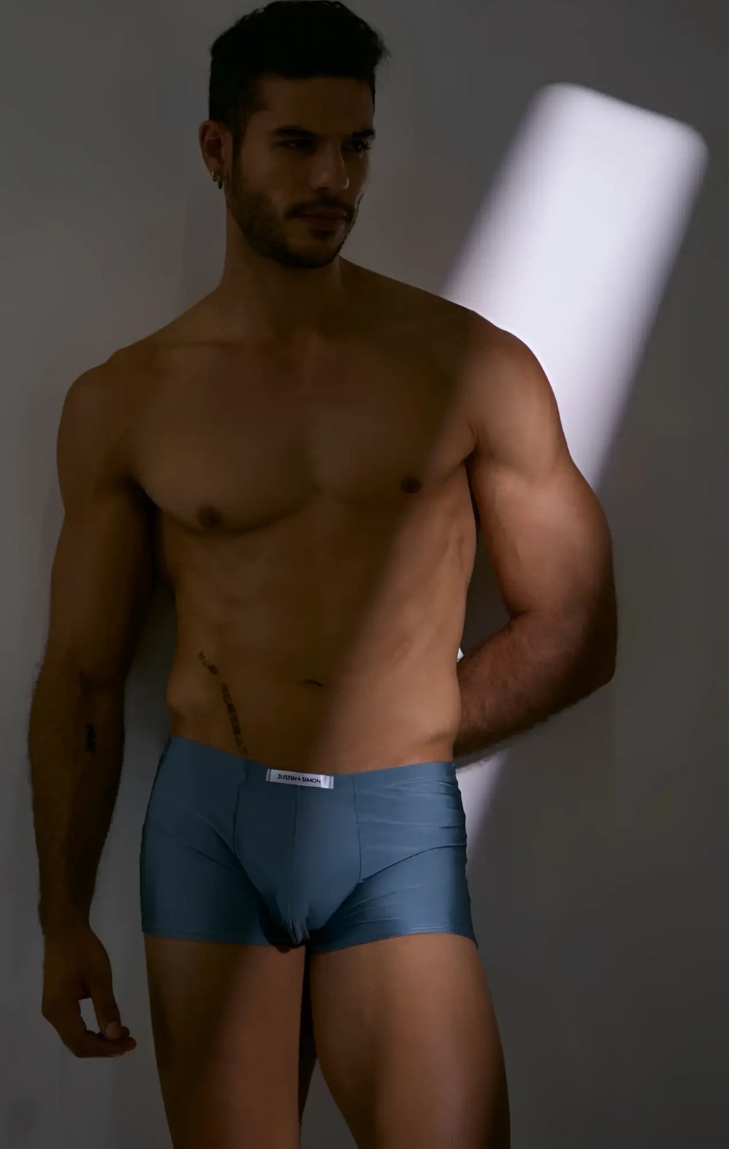 Blue men’s boxer briefs with white waistband and brand label from JUSTIN+SIMON XSJ08 classic boxer metal green