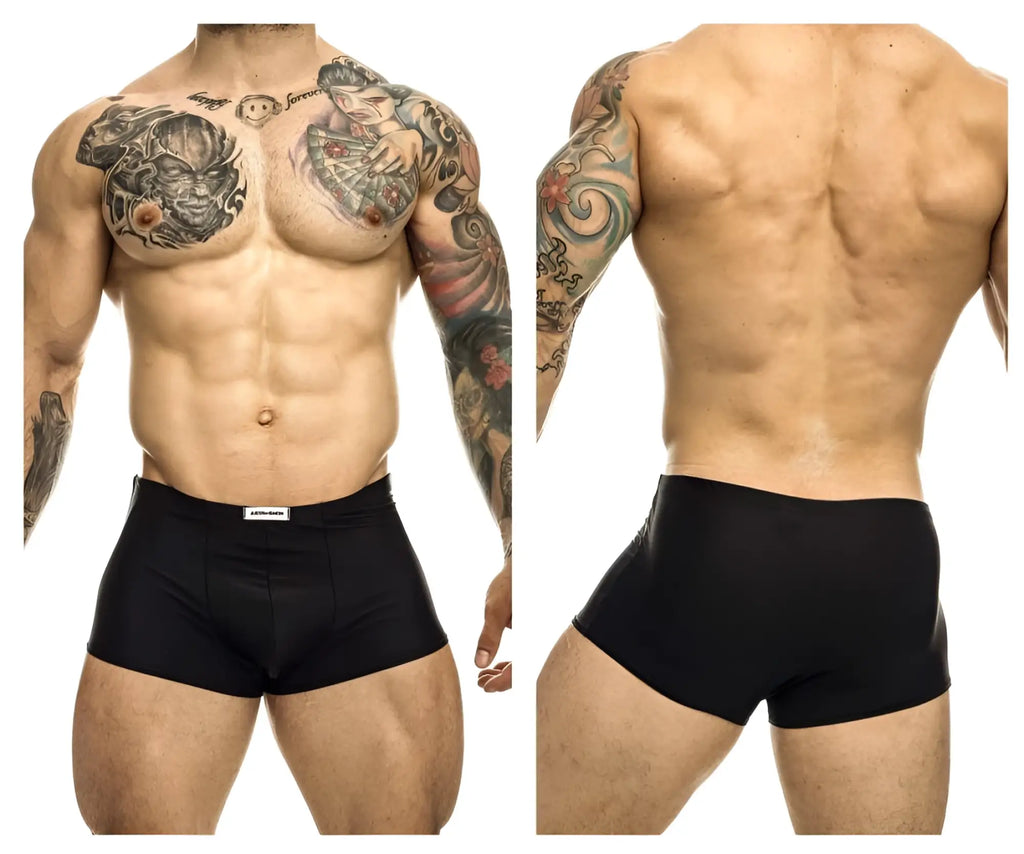 Black justin simon classic trunks with white brand tag on waistband designed for athletic comfort and support