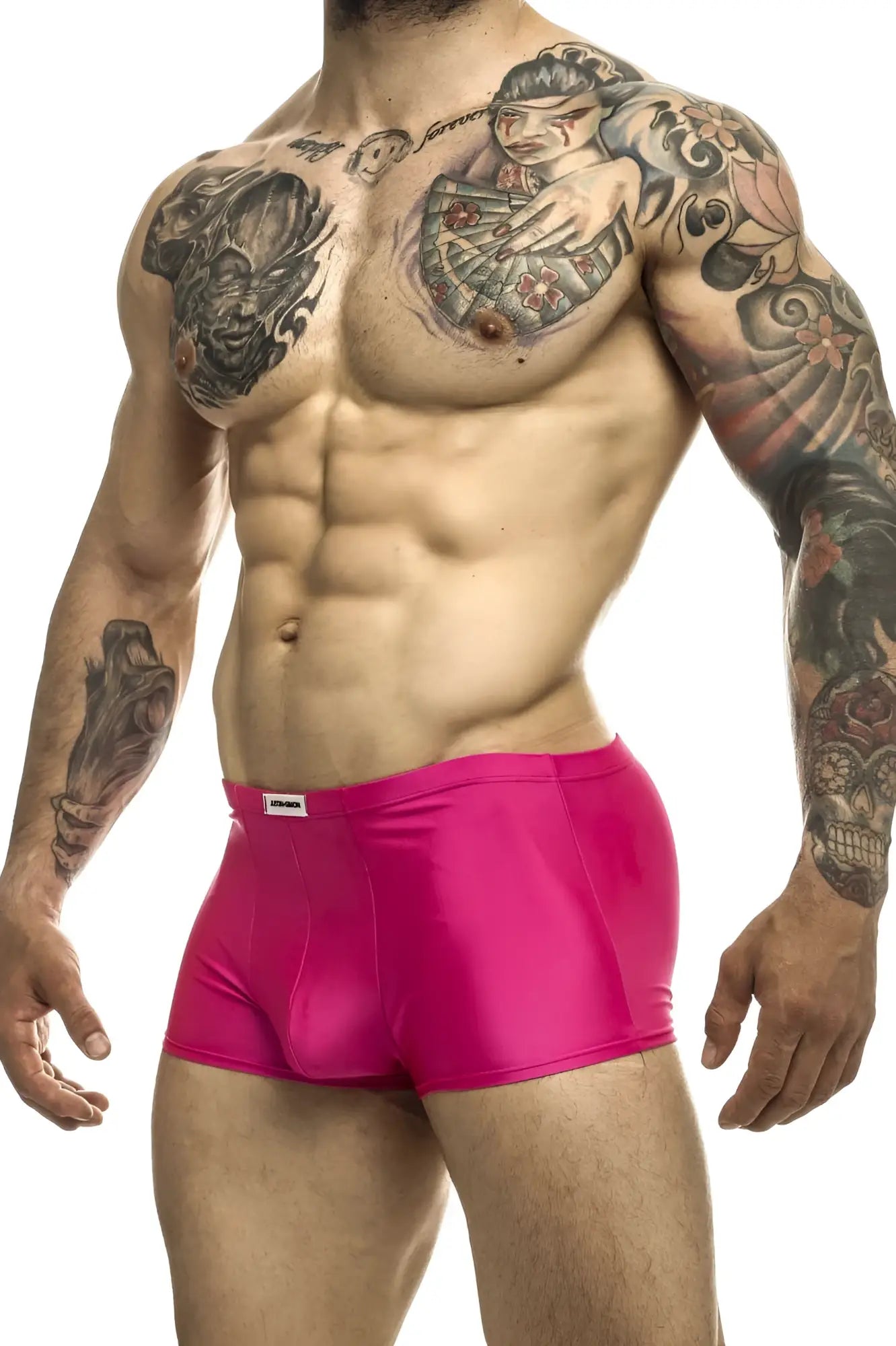 Bright pink shiny fabric briefs with a white brand tag on the waistband from justin+simon xsj08 classic trunks collection