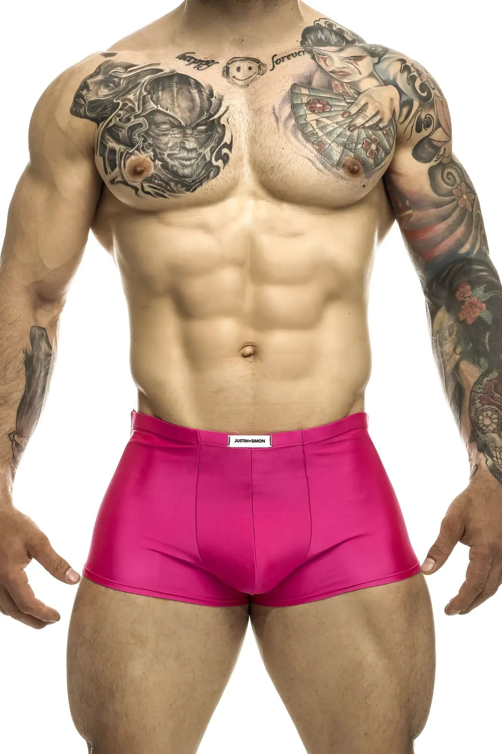 Justin simon xsj08 classic trunks in bright pink shiny fabric with a white brand tag at the waistband