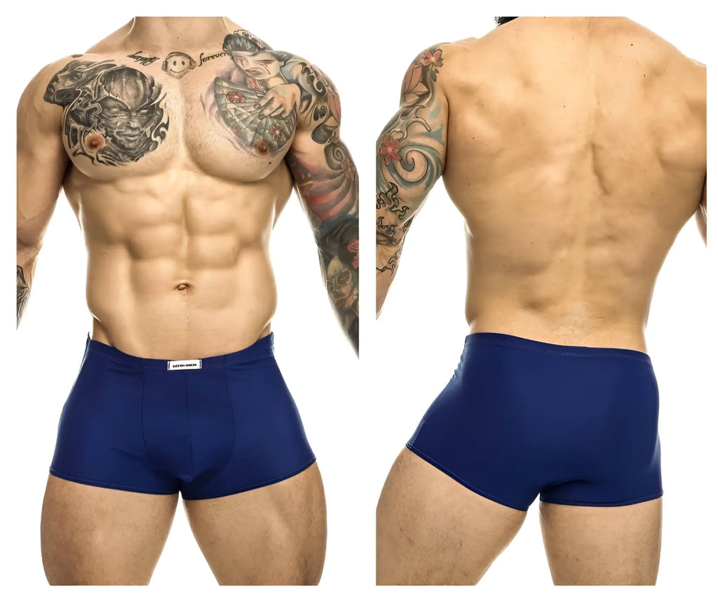 Navy blue justin simon xsj08 classic trunks with a white brand tag at the waistband made from soft fabric