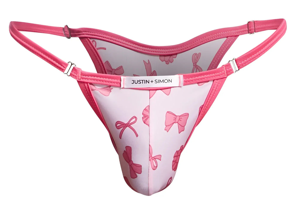 Pink bow-patterned thong by justin + simon from the xsj12 bikini color coquette collection front view