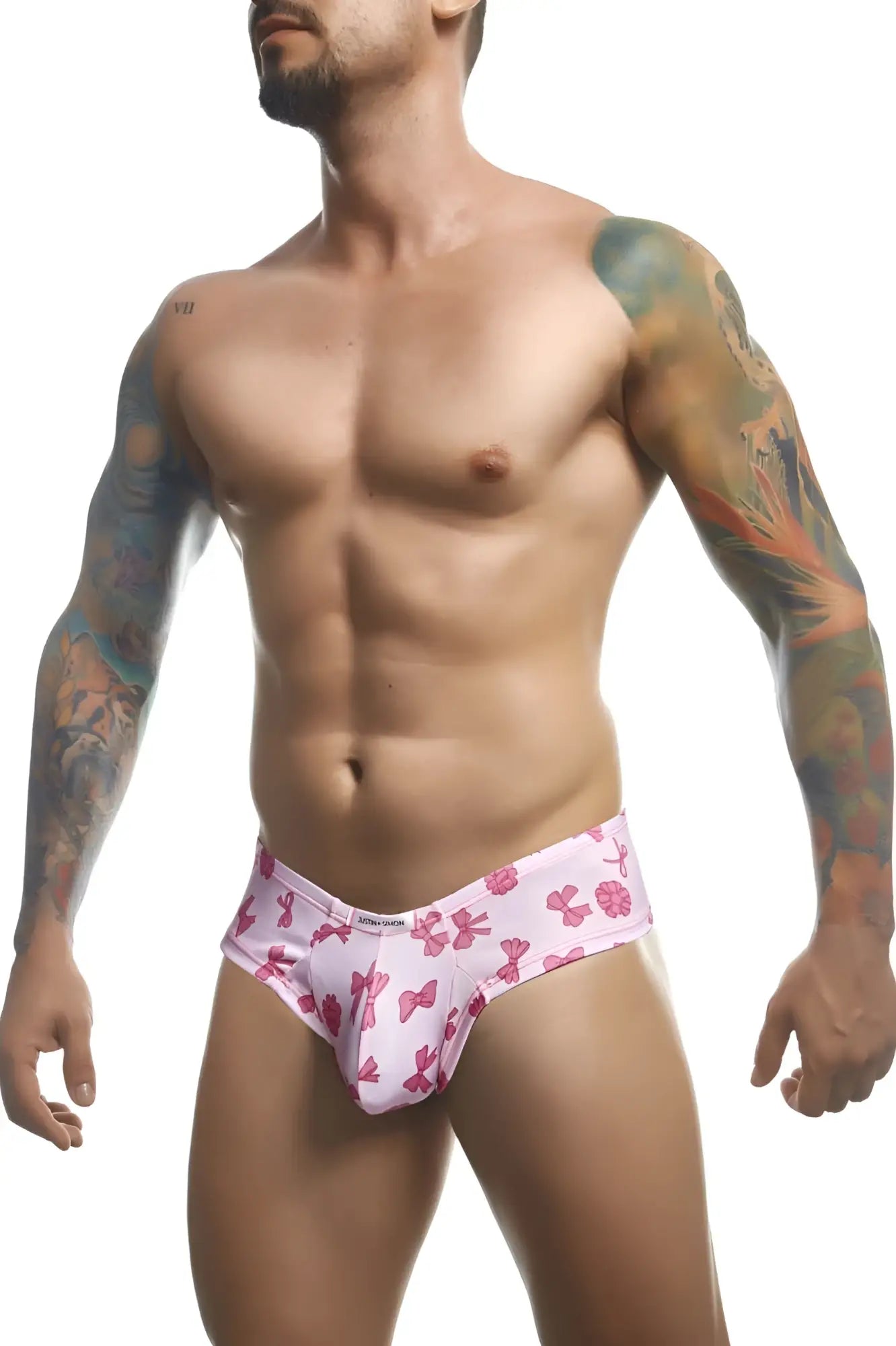 Justin simon xsj22 cheek briefs in coquette color featuring pink bow patterned men’s cotton blend underwear front view