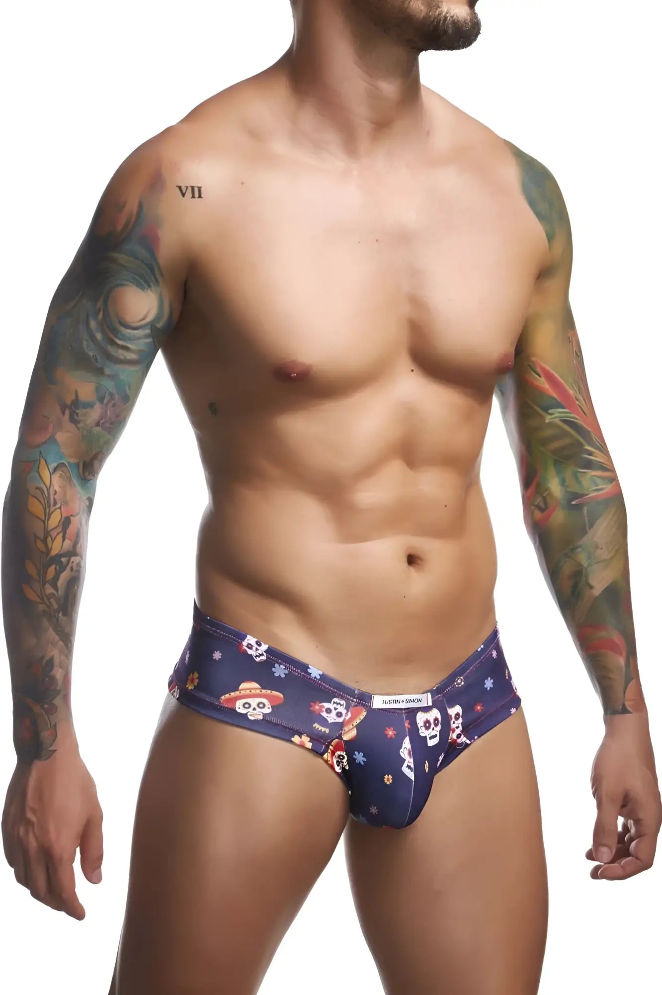 Dark blue calvin klein cheek briefs with colorful skulls wearing hats and festive decorations in mexico color