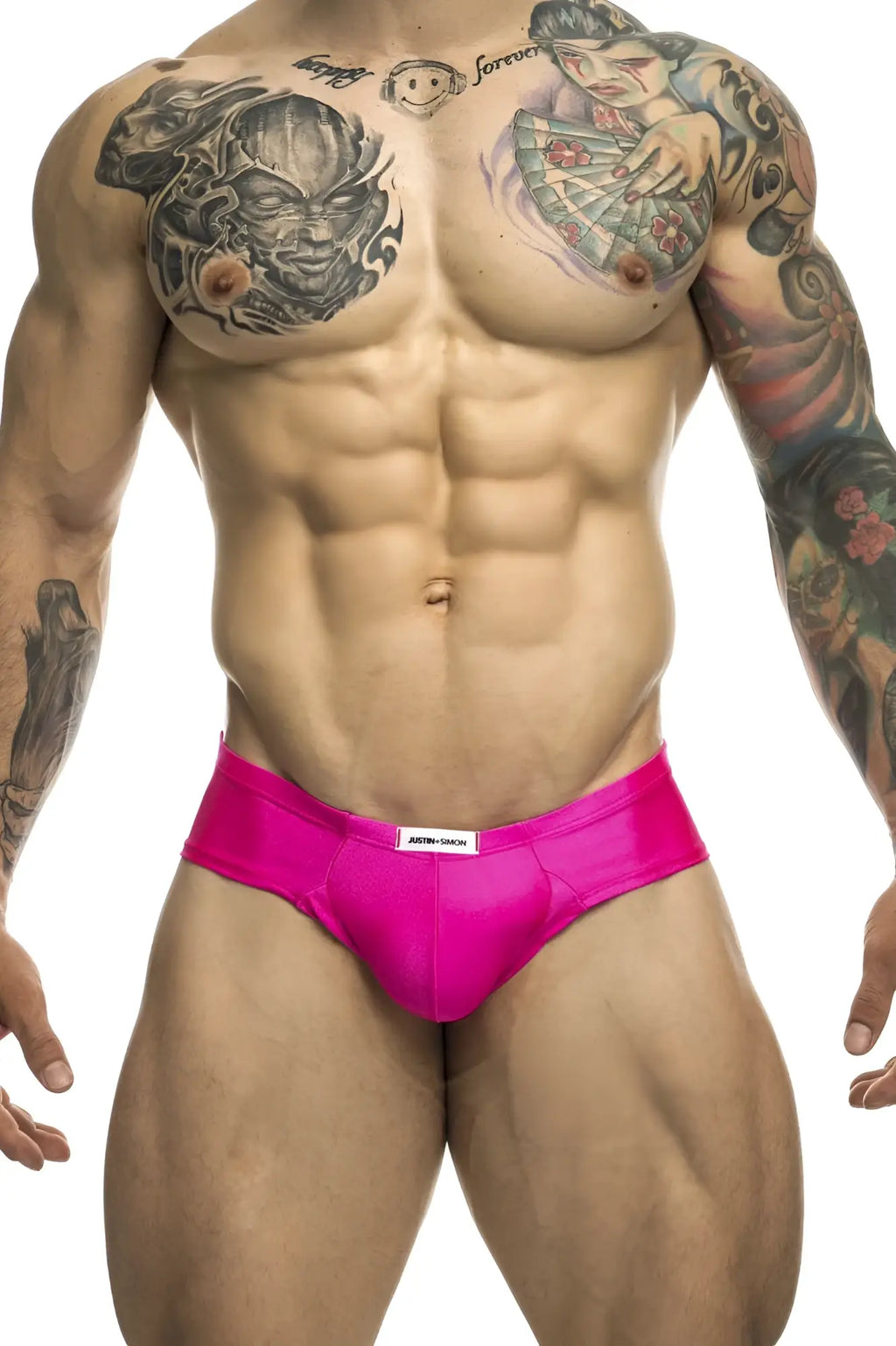 Bright pink sleek fabric briefs with a white Justin Simon brand label at the waistband for comfortable wear