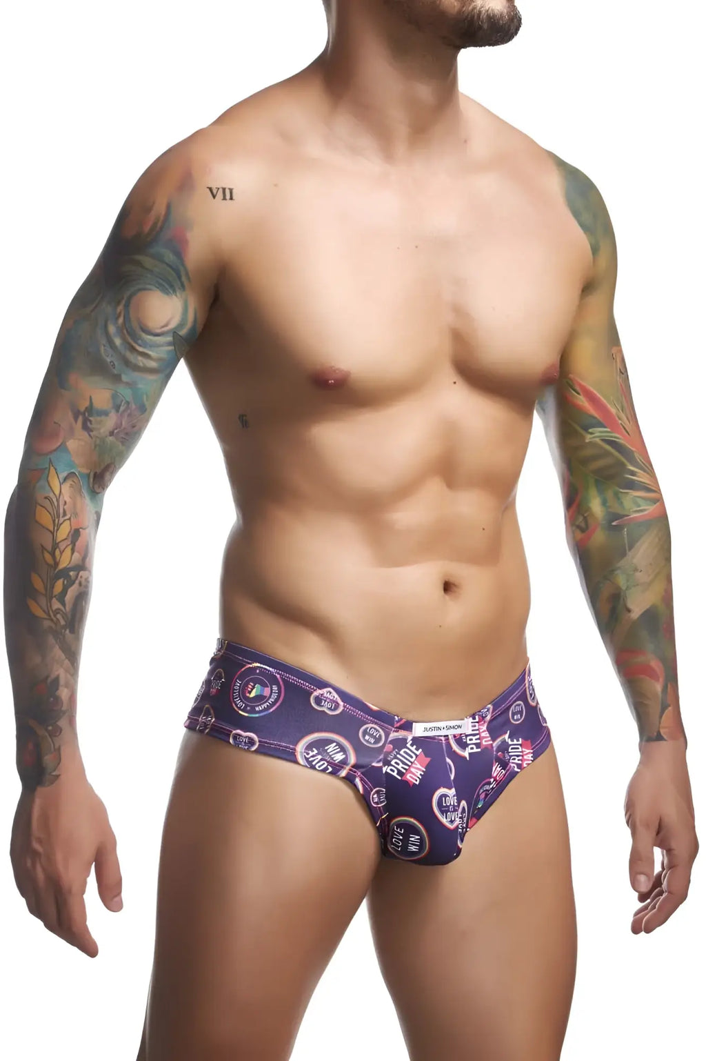 Purple patterned mens briefs with vibrant circular motifs and pride heart symbols from justin simon xsj22 cheek briefs color pride