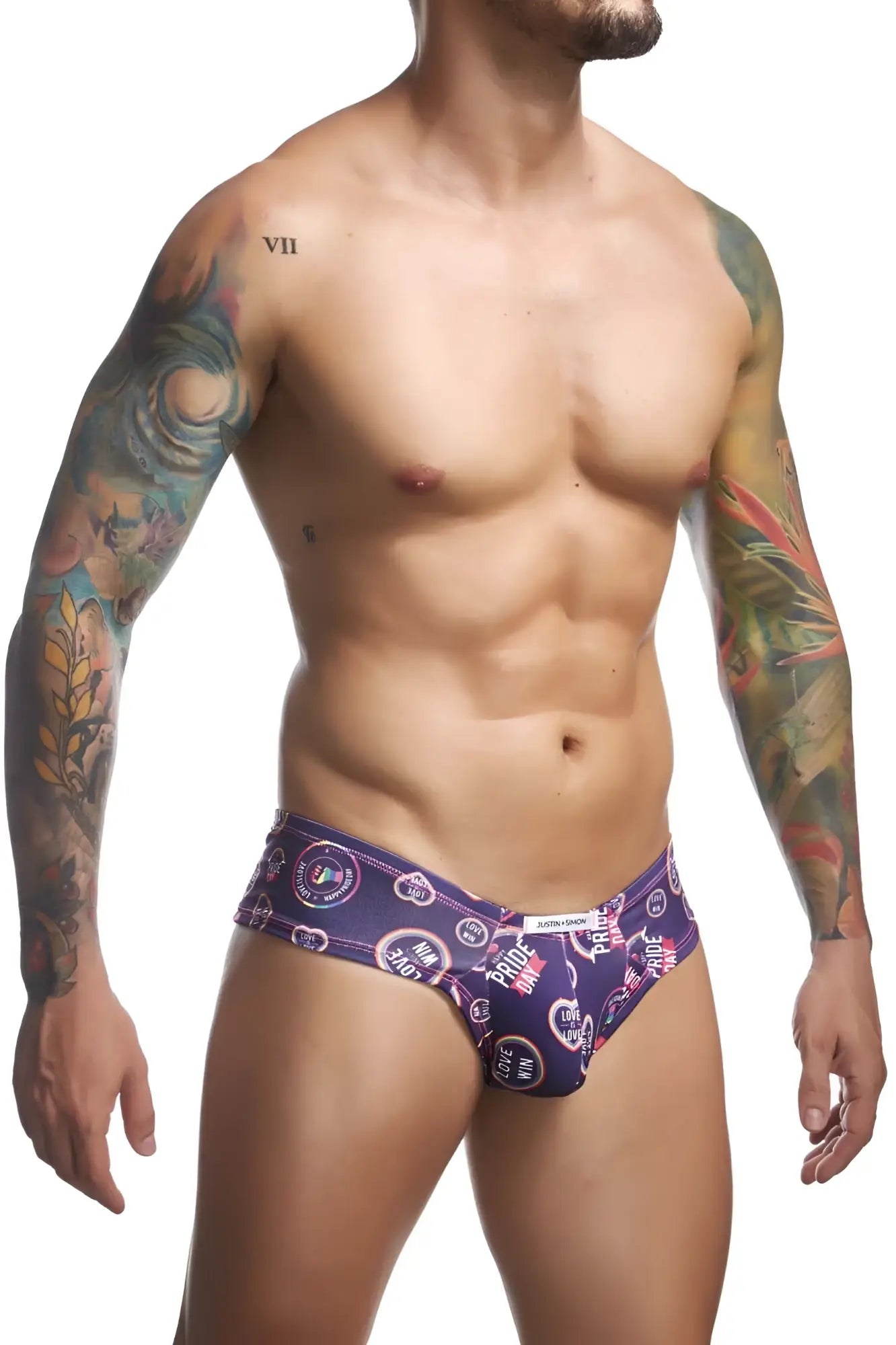 Purple patterned mens briefs with vibrant circular motifs and pride heart symbols from justin simon xsj22 cheek briefs color pride