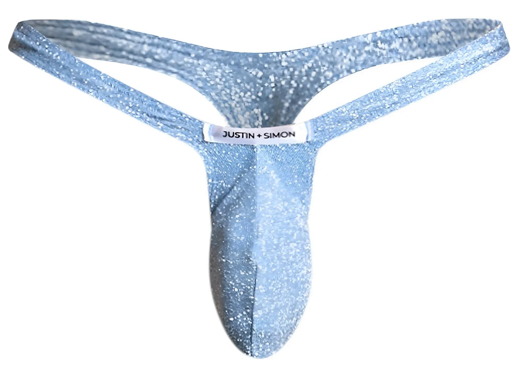 A shimmering light blue glittery lurex bulge thong from justin + simon seen from the front side
