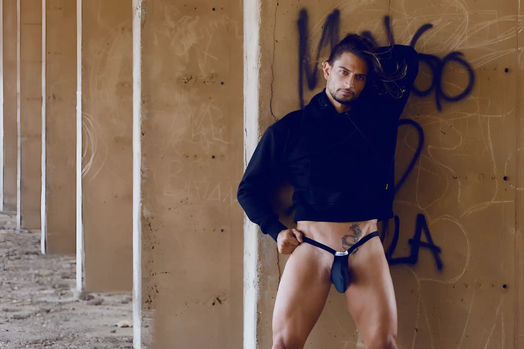 Black leather thong with small silver buckle at front in justin simon xsjbu02 bulge thong opal green color
