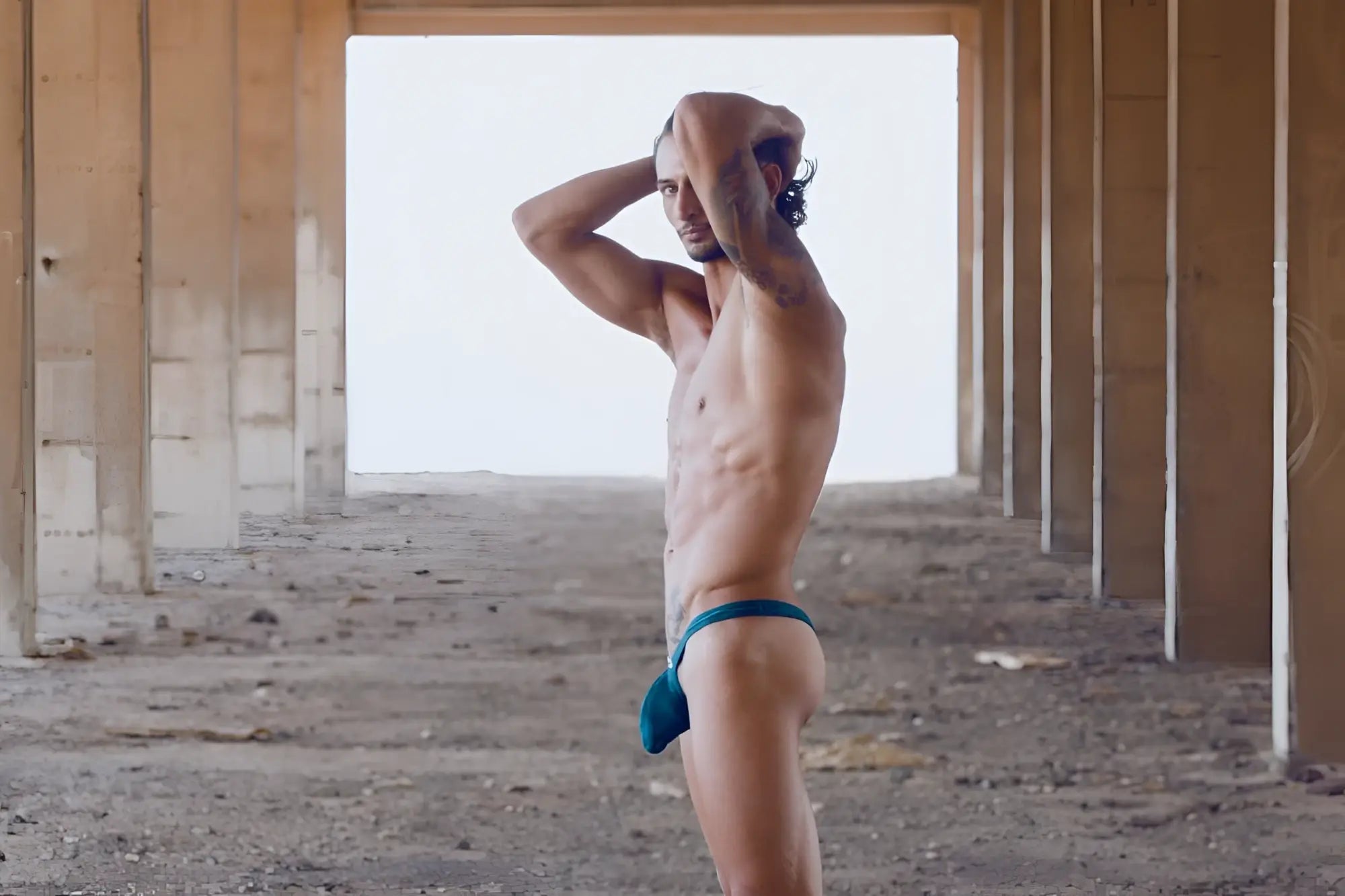 Teal blue jockstrap by JUSTIN SIMON XSJBU02 bulge thongs in opal green designed for supportive comfort