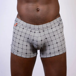 Kaleidoscope sq cut trunk black and white geometric patterned boxer briefs with subtle orange logo on waistband
