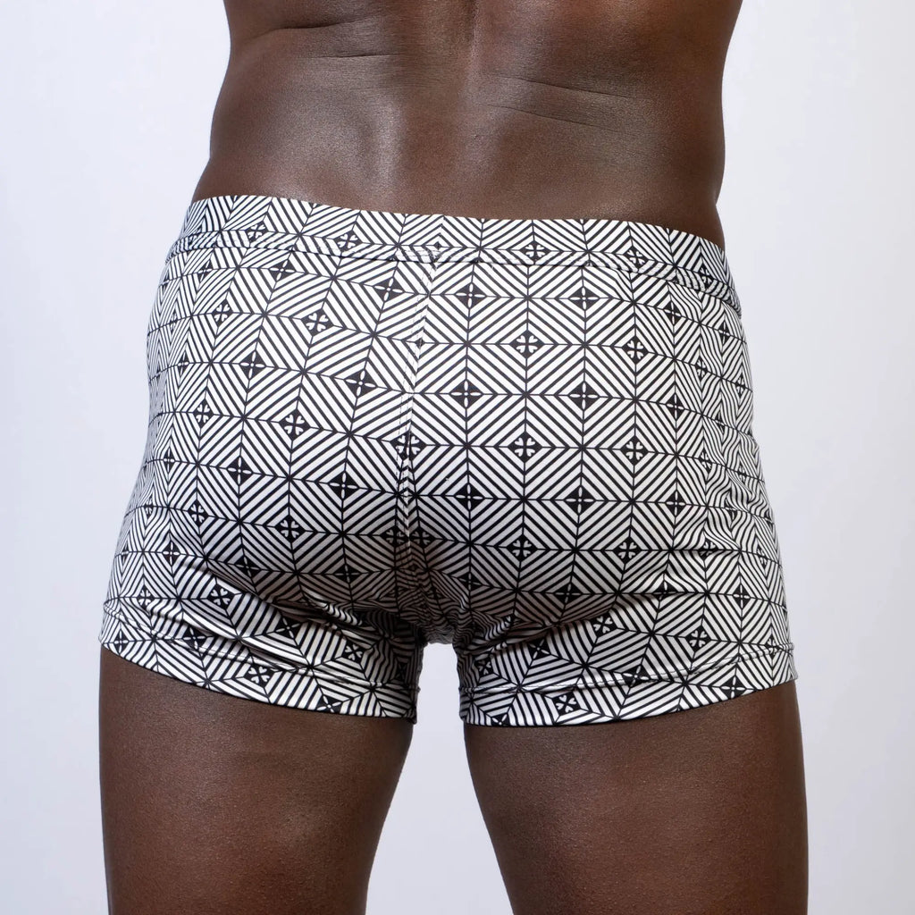 Black and white geometric-patterned kaleidoscope sq cut trunk boxer briefs with a modern angular design